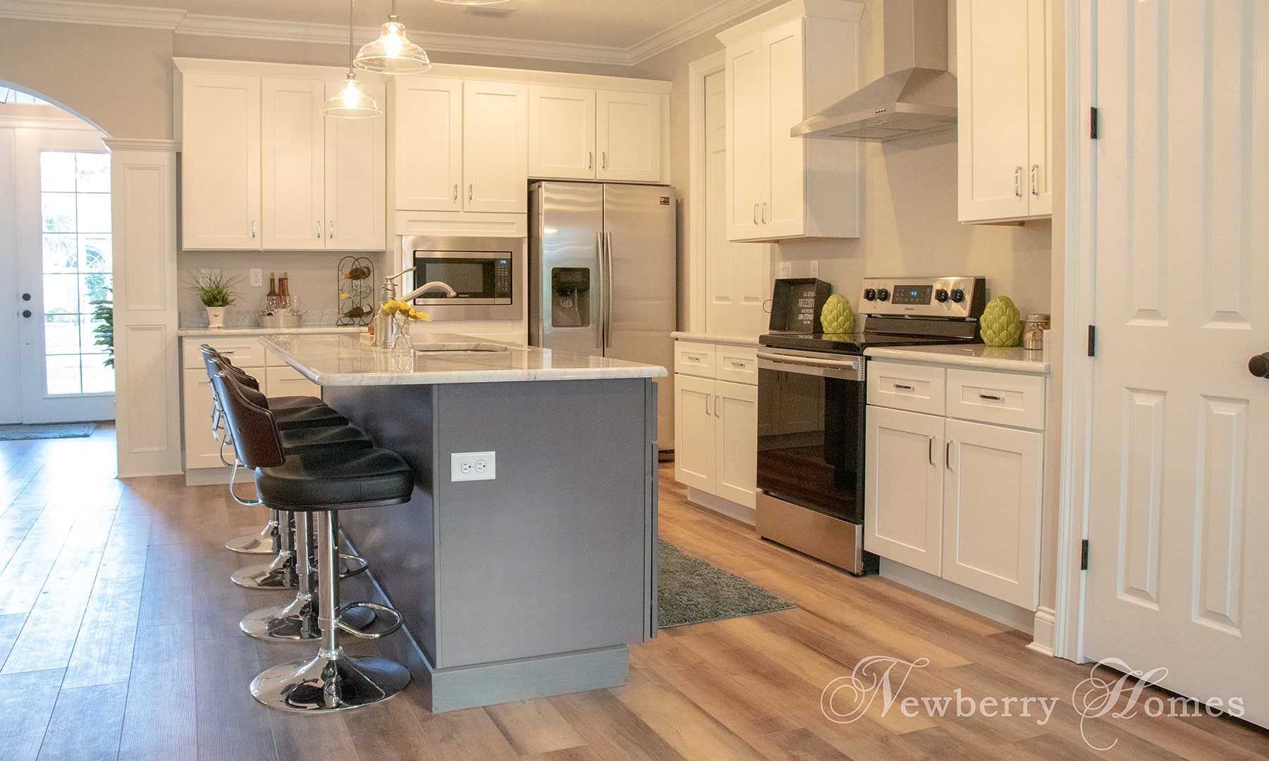 spec house kitchen with white cabinets