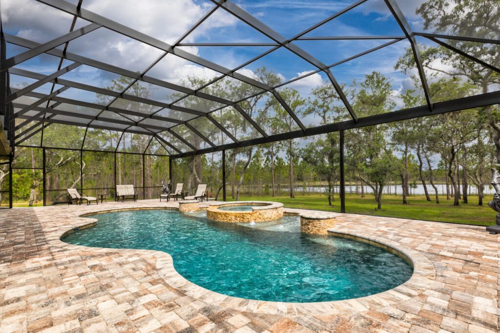 outdoor full screen enclosure for pool and hottub area for the Viviane home
